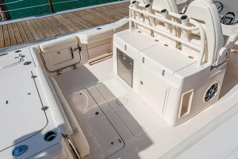  Yacht Photos Pics Manufacturer Provided Image: 2022 Grady-White Canyon 326 boat interior, featuring spacious deck and seating area.