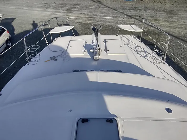 Journey Yacht Photos Pics 2002 Endeavour Trawlercat 36 deck view with railings and equipment.
