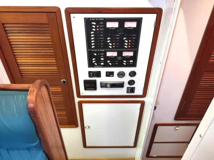 Journey Yacht Photos Pics Control panel inside 2002 Endeavour Trawlercat 36, featuring gauges and switches.