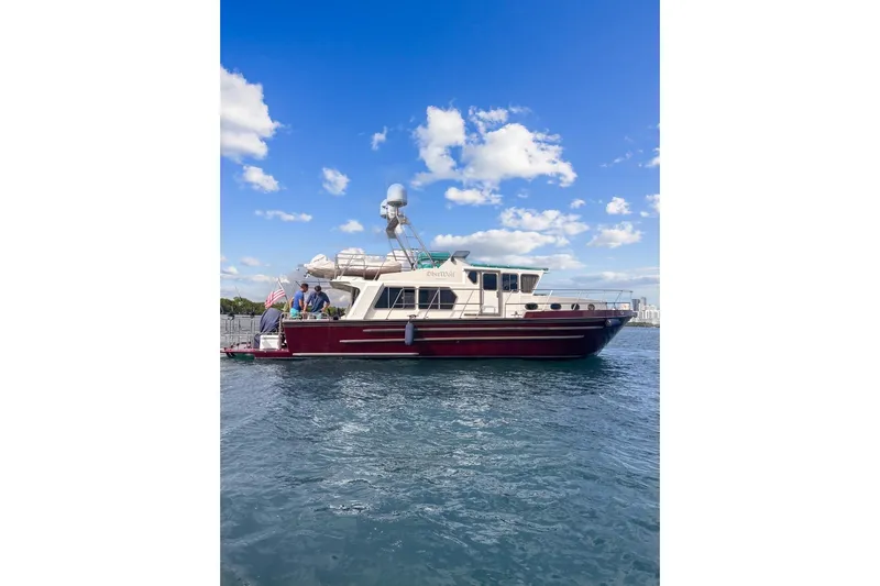 Oberwolf Yacht Photos Pics EagleCraft 47' Pilothouse 2009 yacht on water under blue sky.