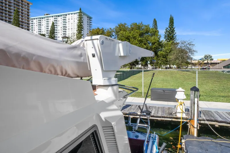 Oberwolf Yacht Photos Pics 2009 EagleCraft 47' Pilothouse docked, featuring deck equipment and marina backdrop.