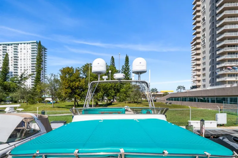 Oberwolf Yacht Photos Pics 2009 EagleCraft 47' Pilothouse yacht docked near urban high-rise buildings.