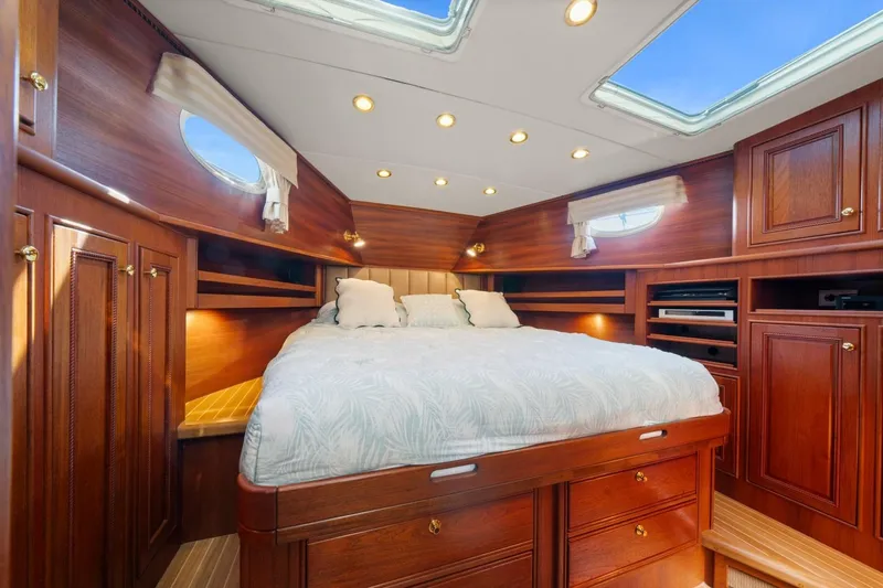 Oberwolf Yacht Photos Pics Luxurious cabin interior of 2009 EagleCraft 47' Pilothouse with wood finish and skylights.