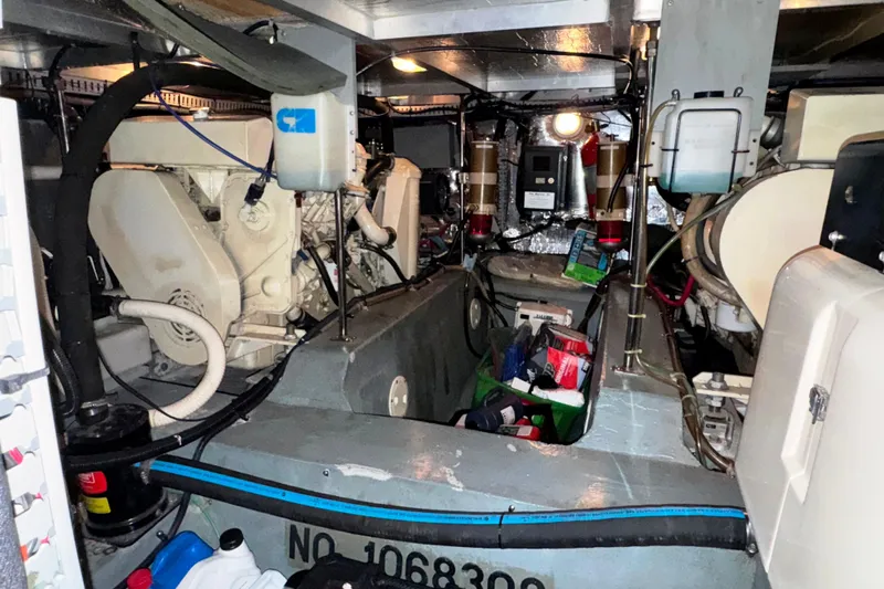  Yacht Photos Pics Engine room of a 1997 Carver 445 Aft Cabin Motor Yacht, showcasing machinery and equipment.