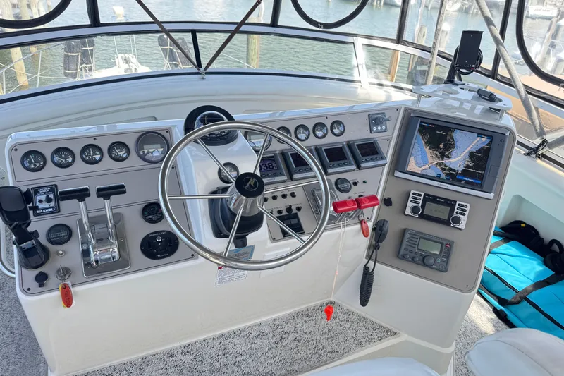  Yacht Photos Pics Control panel of a 1997 Carver 445 Aft Cabin Motor Yacht with navigation equipment.