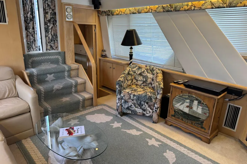  Yacht Photos Pics Interior of 1997 Carver 445 Aft Cabin Motor Yacht with cozy seating and nautical decor.