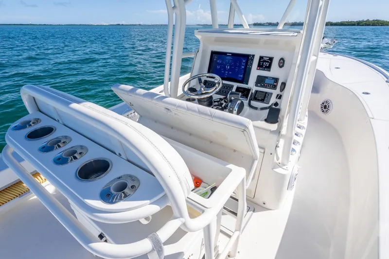  Yacht Photos Pics 2017 SeaVee 270Z boat cockpit with modern controls and rod holders on open water.