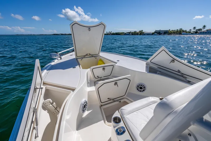  Yacht Photos Pics 2017 SeaVee 270Z boat interior with open storage compartments on a sunny day.