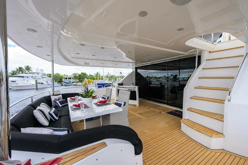 21 Sea Sands Yacht Photos Pics Luxurious 2009 Princess 95 yacht deck with elegant dining area and staircase.