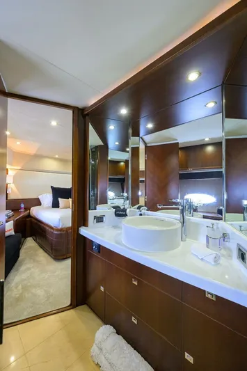 21 Sea Sands Yacht Photos Pics Luxurious bathroom interior on a 2009 Princess 95 yacht, featuring modern fixtures and elegant design.