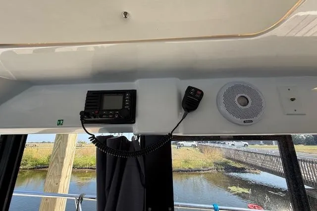  Yacht Photos Pics Interior view of 2020 Jeanneau NC 1095 Fly boat with communication equipment.