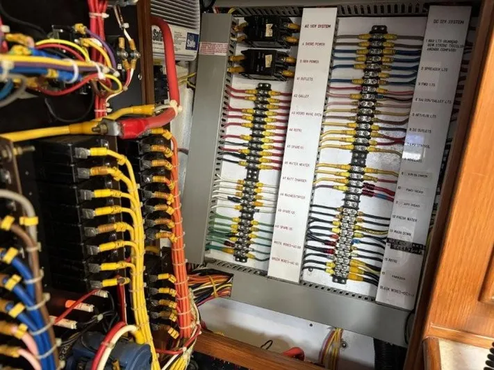 Seacape Yacht Photos Pics Electrical panel with colorful wiring in a 1996 Hylas 46 yacht.