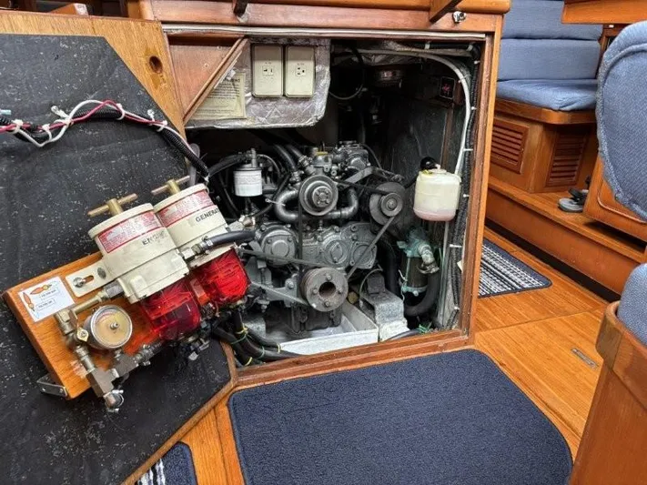 Seacape Yacht Photos Pics Engine compartment of a 1996 Hylas 46 sailboat, showcasing detailed mechanical components.