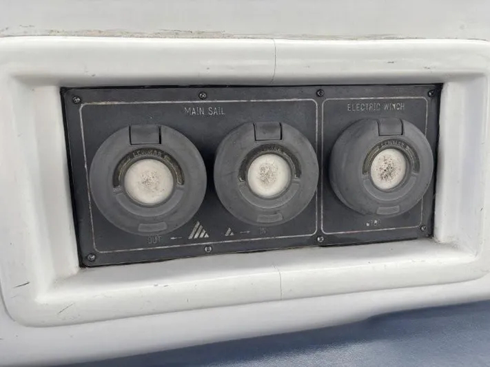 Seacape Yacht Photos Pics Control panel on a 1996 Hylas 46 sailboat with main sail and electric winch switches.