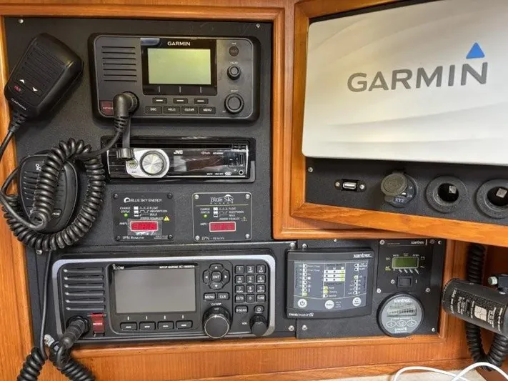 Seacape Yacht Photos Pics Navigation and communication equipment on a 1996 Hylas 46 yacht, featuring Garmin devices.