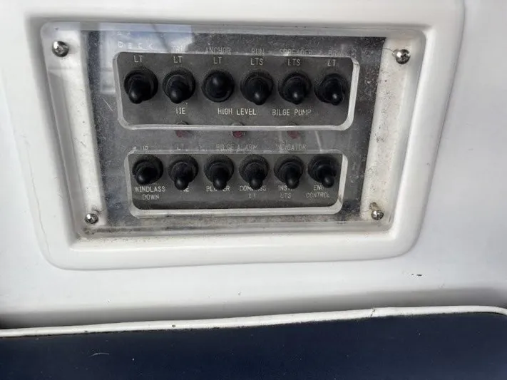 Seacape Yacht Photos Pics Control panel on a 1996 Hylas 46 yacht with labeled switches.