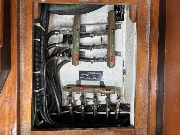 Seacape Yacht Photos Pics Electrical panel with labeled switches and wiring inside a 1996 Hylas 46 yacht.