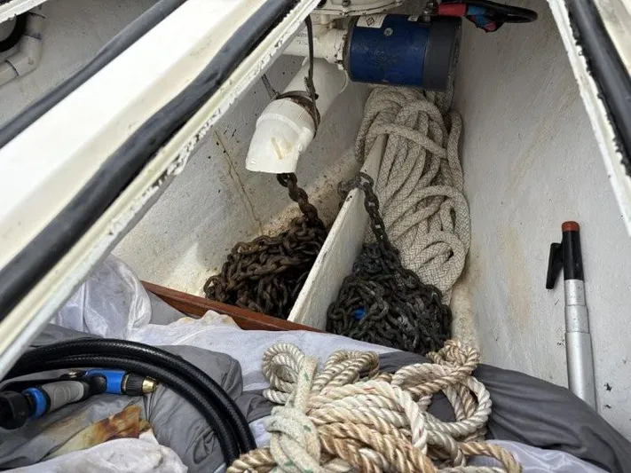 Seacape Yacht Photos Pics Anchor locker of a 1996 Hylas 46 sailboat with chains and ropes.
