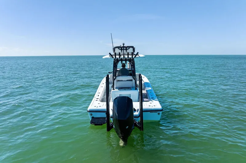  Yacht Photos Pics 2020 Barker Boatworks 26 Open on calm ocean waters, rear view.