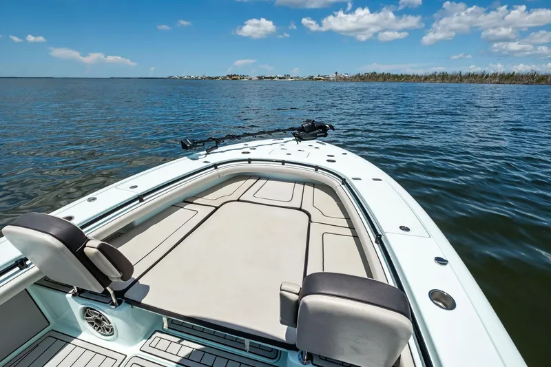  Yacht Photos Pics 2020 Barker Boatworks 26 Open on calm water under blue sky.
