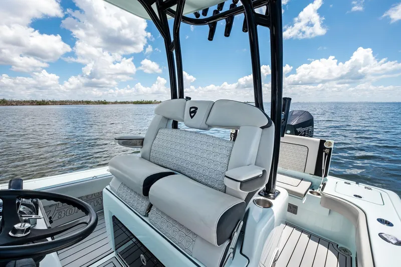  Yacht Photos Pics 2020 Barker Boatworks 26 Open on water, featuring sleek seating and steering console.