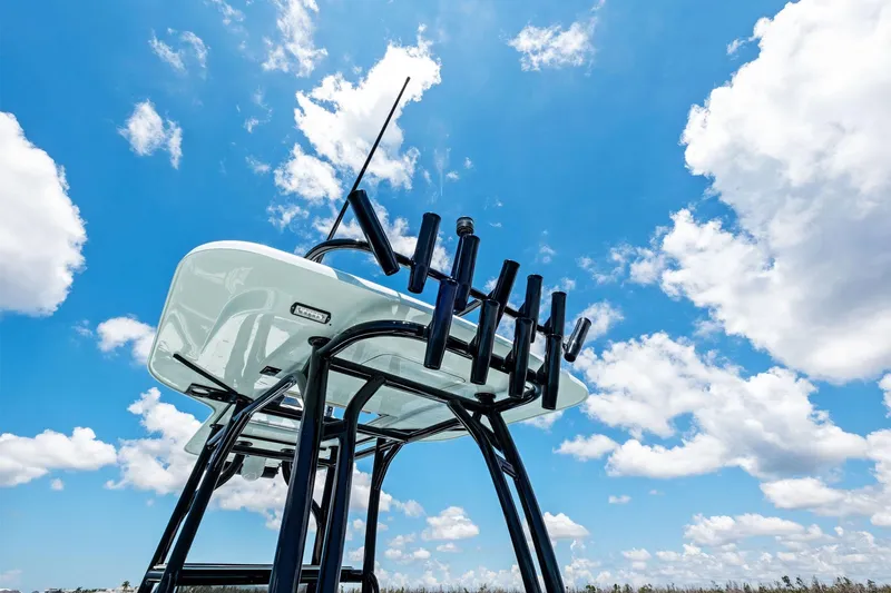  Yacht Photos Pics Barker Boatworks 26 Open 2020 model against a bright blue sky with clouds.