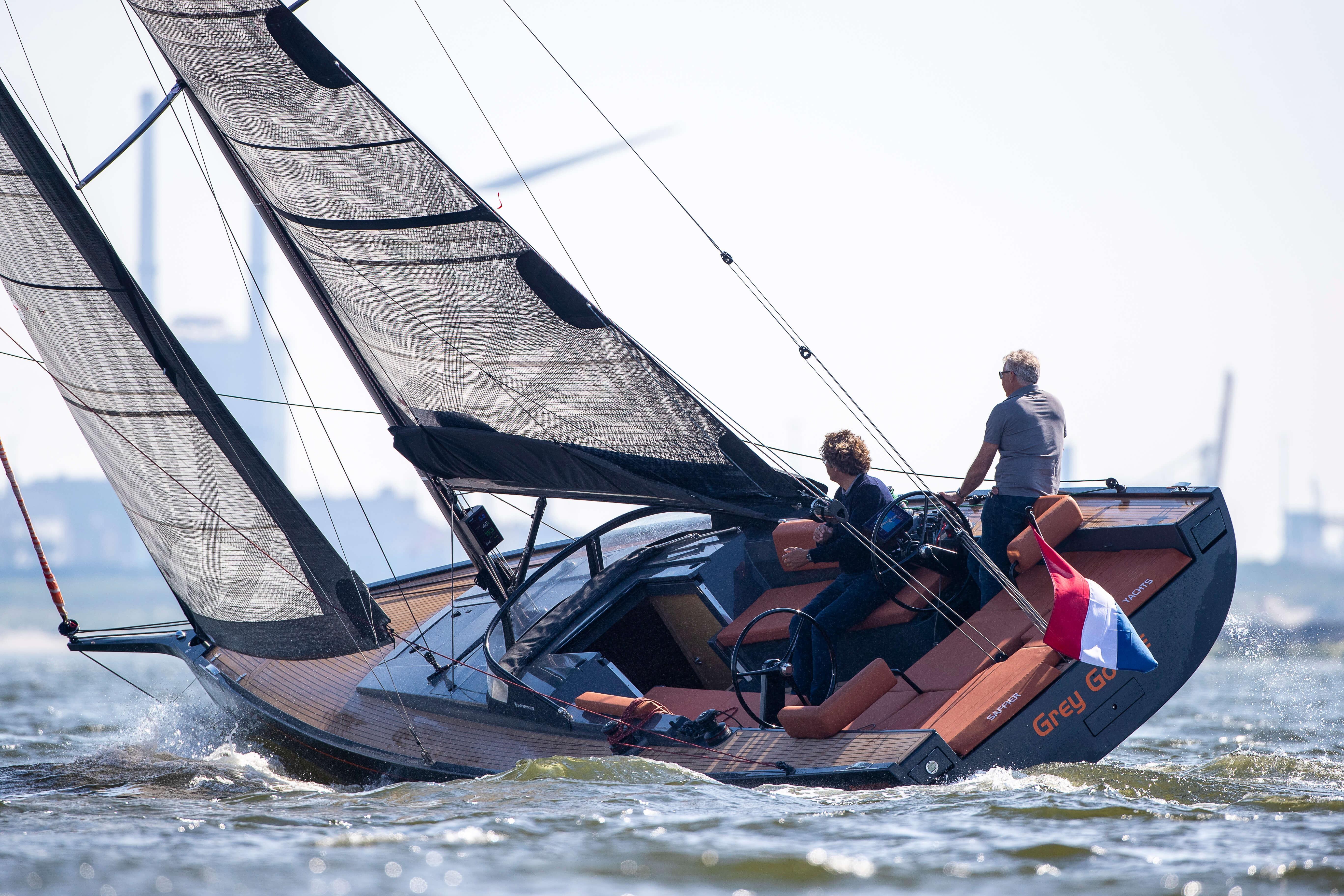 Saffier SE 33 Life 2026 sailing yacht on water with two people onboard.
