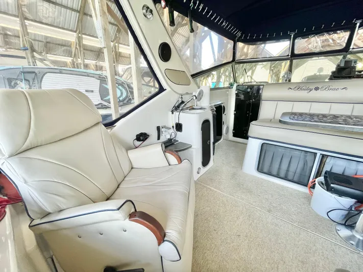 Hailey Brae Yacht Photos Pics Luxurious interior of a 2021 Custom Express Cruiser with plush seating and modern amenities.