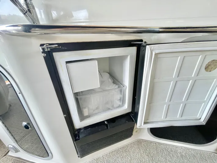 Hailey Brae Yacht Photos Pics Built-in mini fridge on 2021 Custom Express Cruiser yacht.