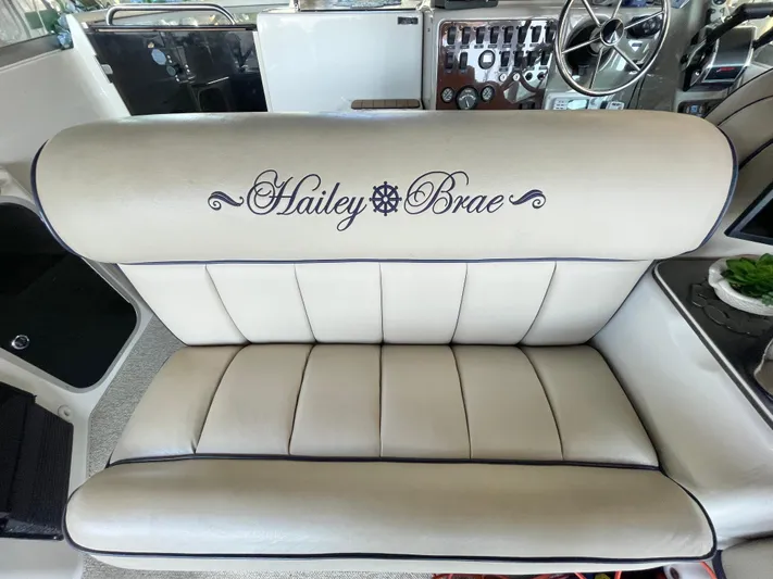 Hailey Brae Yacht Photos Pics Luxurious seating on 2021 Custom Express Cruiser with embroidered name detail.