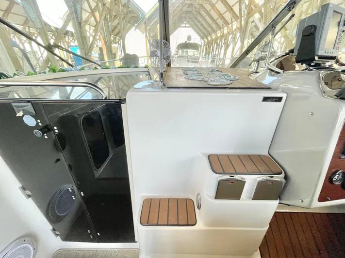 Hailey Brae Yacht Photos Pics Interior of 2021 Custom Express Cruiser with steps and control panel.