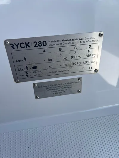  Yacht Photos Pics RYCK 280 boat specification plate showing weight limits and manufacturer details.