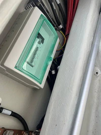  Yacht Photos Pics Electrical panel in a 2023 RYCK 28 boat, featuring wiring and components.
