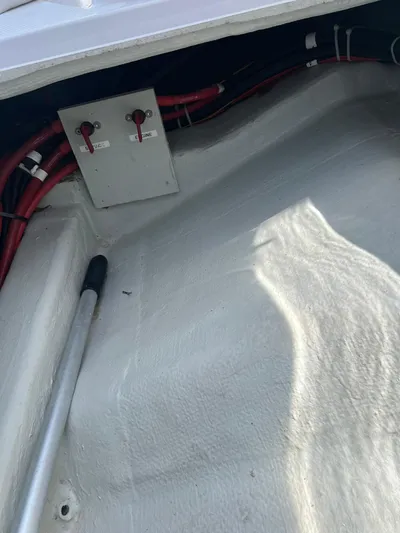  Yacht Photos Pics Interior view of a 2023 RYCK 28 boat showing wiring and control panel.