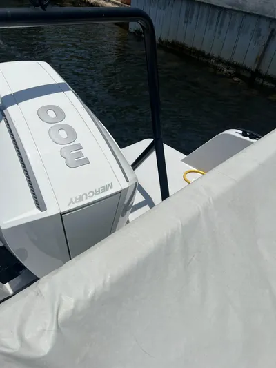  Yacht Photos Pics RYCK 28 boat with Mercury 300 engine, docked by the water, 2023 model.