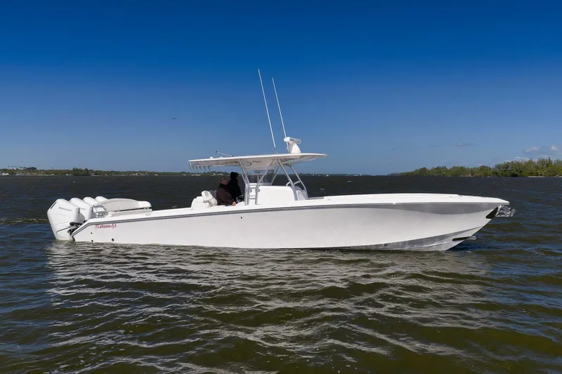 Bahama 41 Yacht Photos Pics 2024 Bahama 41 RD boat cruising on a sunny day with clear blue skies.