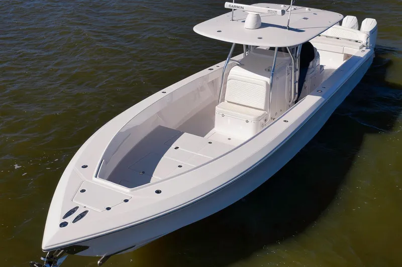 Bahama 41 Yacht Photos Pics 2024 Bahama 41 RD boat on water, showcasing sleek design and spacious deck.