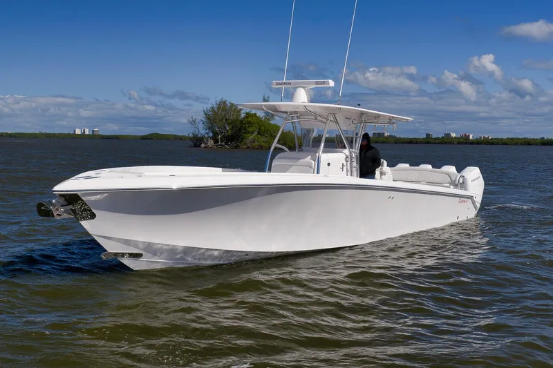 Bahama 41 Yacht Photos Pics 2024 Bahama 41 RD boat cruising on a sunny day with clear skies.