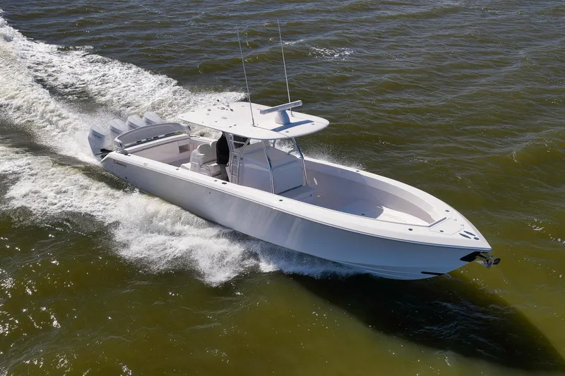 Bahama 41 Yacht Photos Pics 2024 Bahama 41 RD boat cruising on open water, showcasing sleek design and powerful engines.