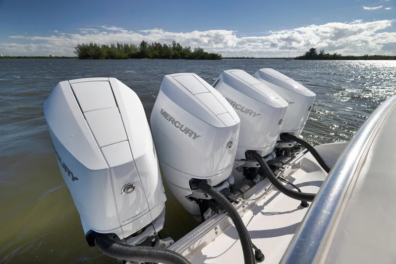 Bahama 41 Yacht Photos Pics 2024 Bahama 41 RD boat with four Mercury outboard engines on a sunny day.