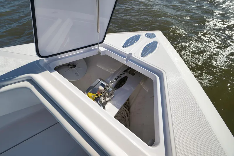 Bahama 41 Yacht Photos Pics Open anchor compartment on 2024 Bahama 41 RD boat, showing chain and winch.