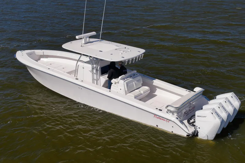 Bahama 41 Yacht Photos Pics 2024 Bahama 41 RD boat with triple Mercury engines on open water.