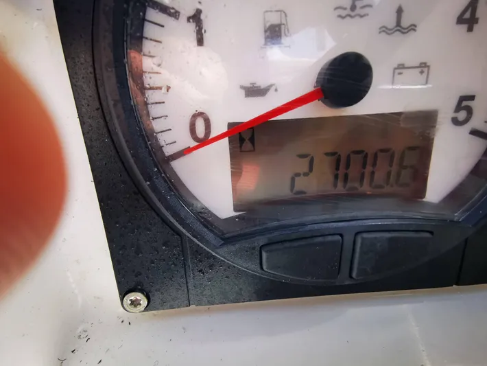 Phat Dolphin Yacht Photos Pics Close-up of Jeanneau Sun Odyssey 479 gauge displaying 2700.6 hours.