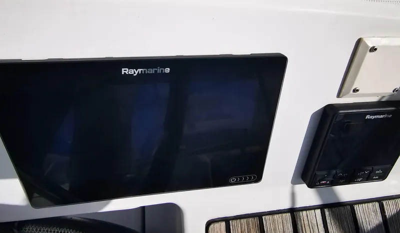 Phat Dolphin Yacht Photos Pics Raymarine navigation equipment on 2019 Jeanneau Sun Odyssey 479 yacht dashboard.