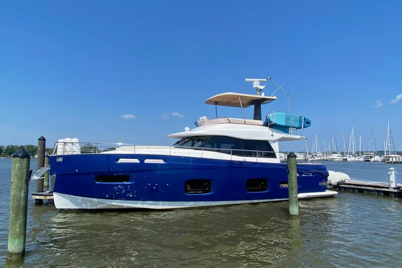 Sparrow Yacht Photos Pics 2014 Azimut Magellano 50 yacht docked at marina under clear blue sky.