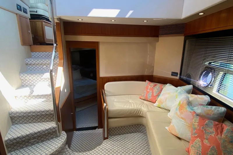 Sparrow Yacht Photos Pics Luxurious interior of 2014 Azimut Magellano 50 yacht with plush seating and elegant decor.