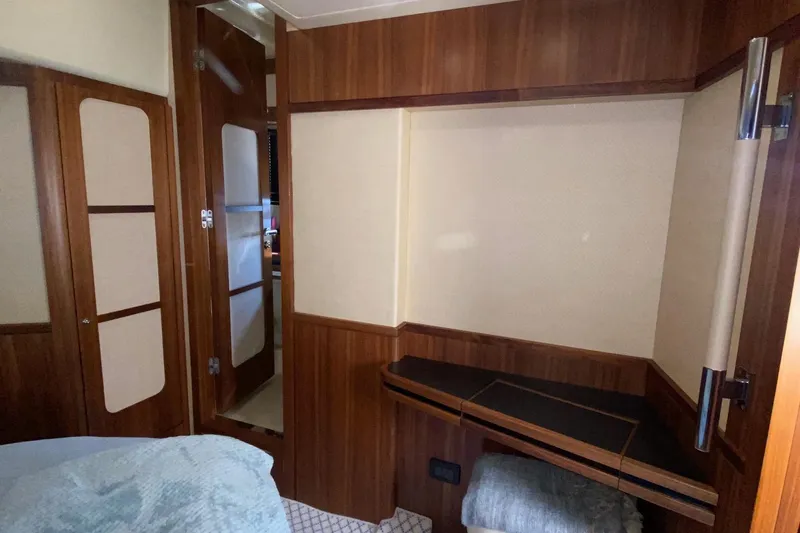 Sparrow Yacht Photos Pics Interior of 2014 Azimut Magellano 50 yacht with wood paneling and cozy design.