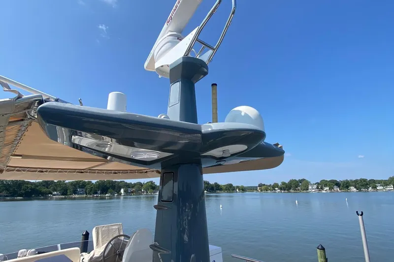 Sparrow Yacht Photos Pics 2014 Azimut Magellano 50 yacht radar mast against a clear blue sky.