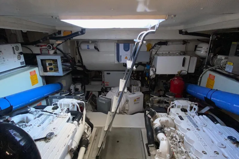 Sparrow Yacht Photos Pics Engine room of 2014 Azimut Magellano 50 yacht, featuring dual engines and equipment.