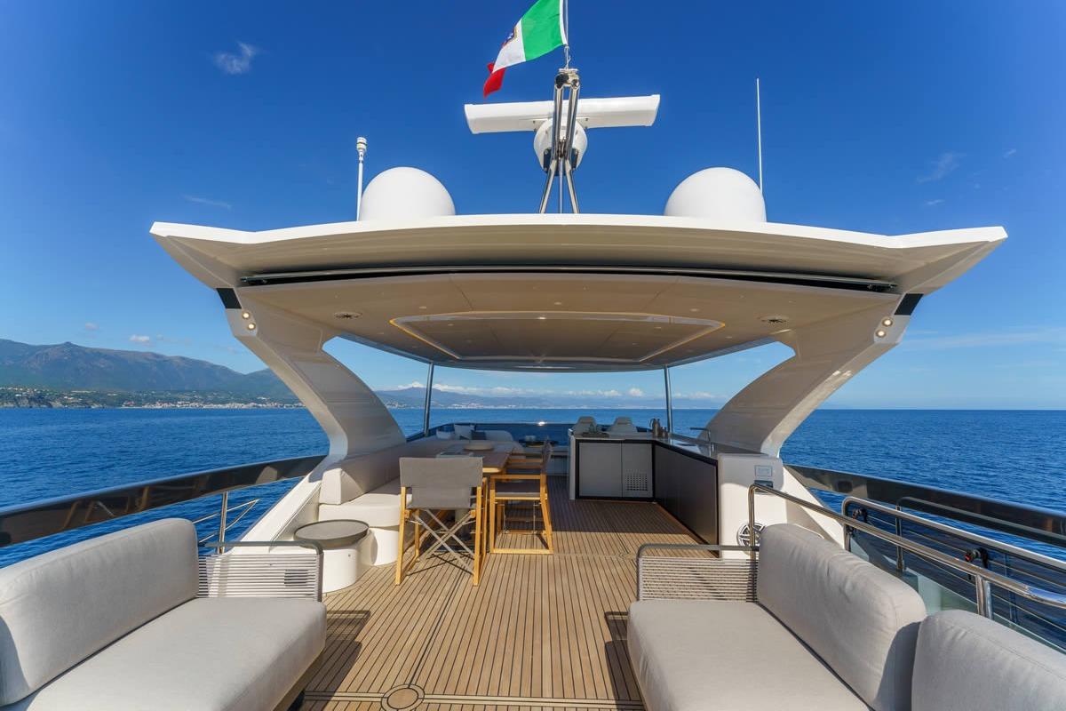Luxurious 2026 Absolute 70' Fly yacht with spacious deck and ocean view.